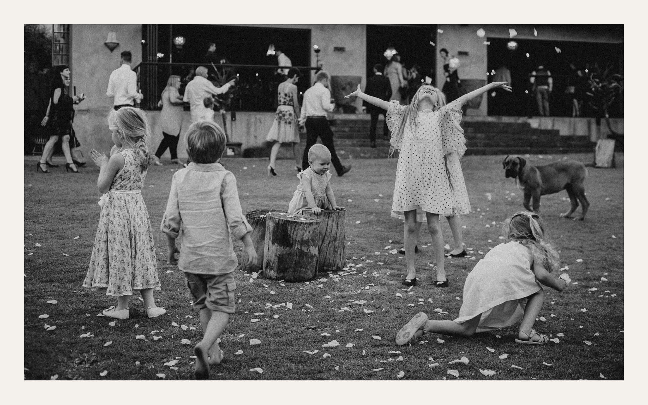 Children playing with confetti — Ben Viljoen Photography