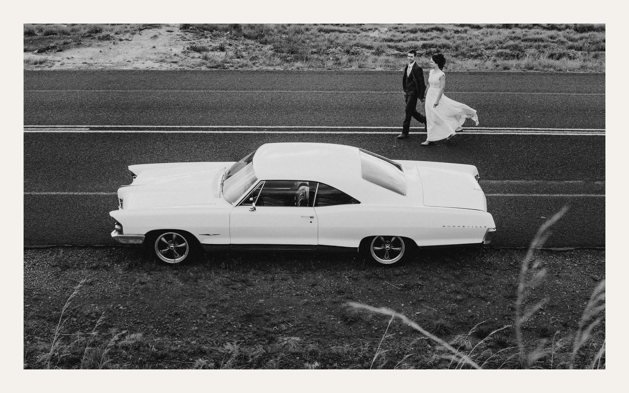 Vintage white car on an empty road — Ben Viljoen Photography